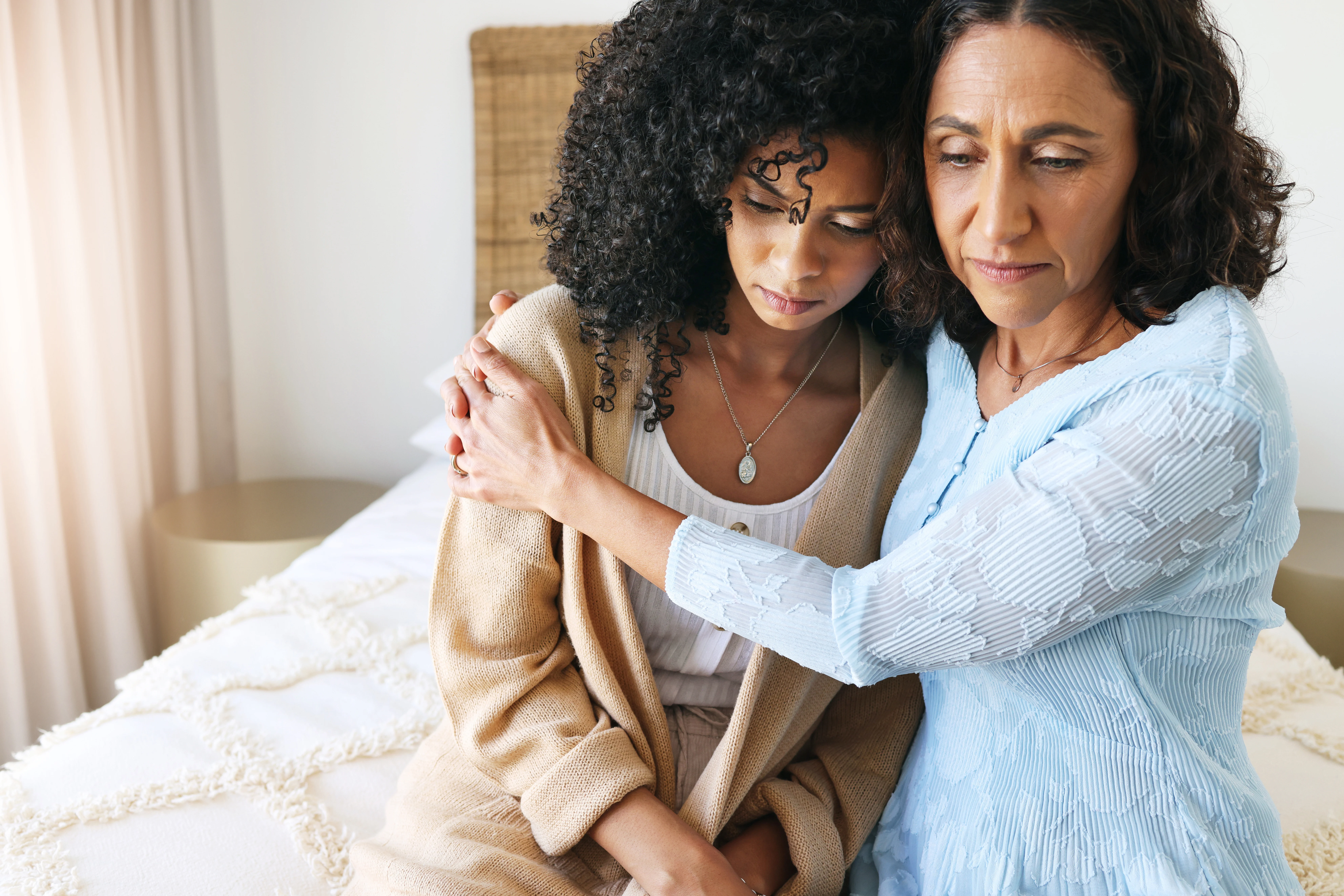 mother supporting daughter during depression counseling