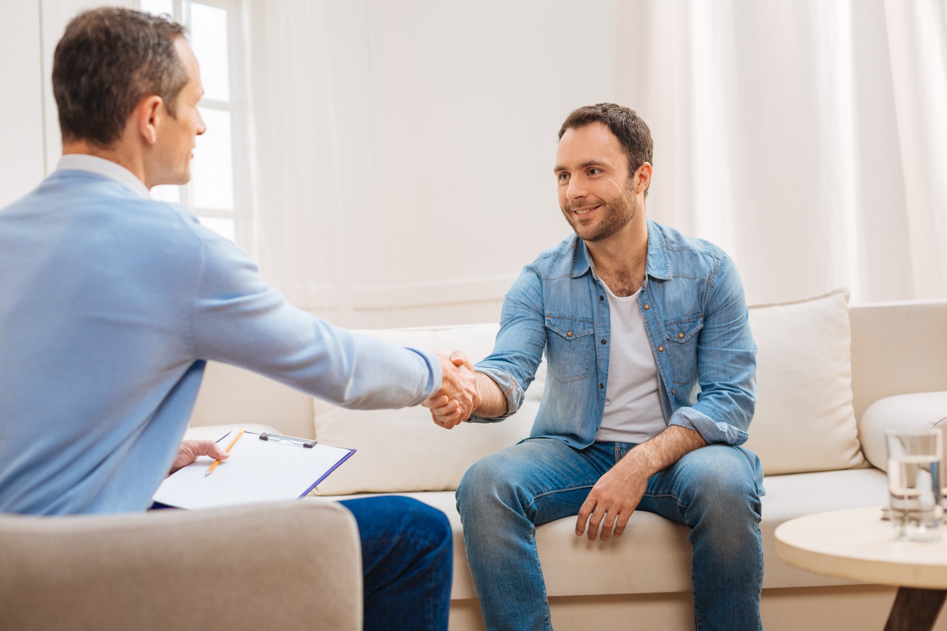 man with bipolar disorder talking to his therapist